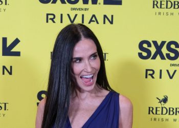 In Saint Laurent, Demi Moore Rivals Angelina Jolie’s Iconic Slit Dress Moment