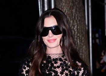 Anne Hathaway’s Pop Star Wardrobe Is Naked Dress-Forward