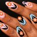 33 Actually Groundbreaking Flower Nail Designs to Wear Right Now